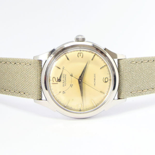 1950s Unusual Baume Swiss Power Reserve Automatic Wristwatch with Mixed Arrow & Arabic Numerals