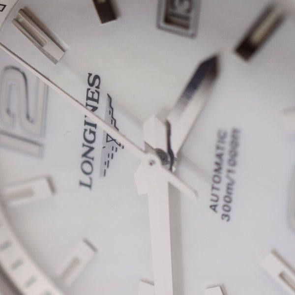 Longines Conquest Automatic Watch Model L36554862 in 39mm with MOP Dial - Stainless Steel & Ceramic Case with Box