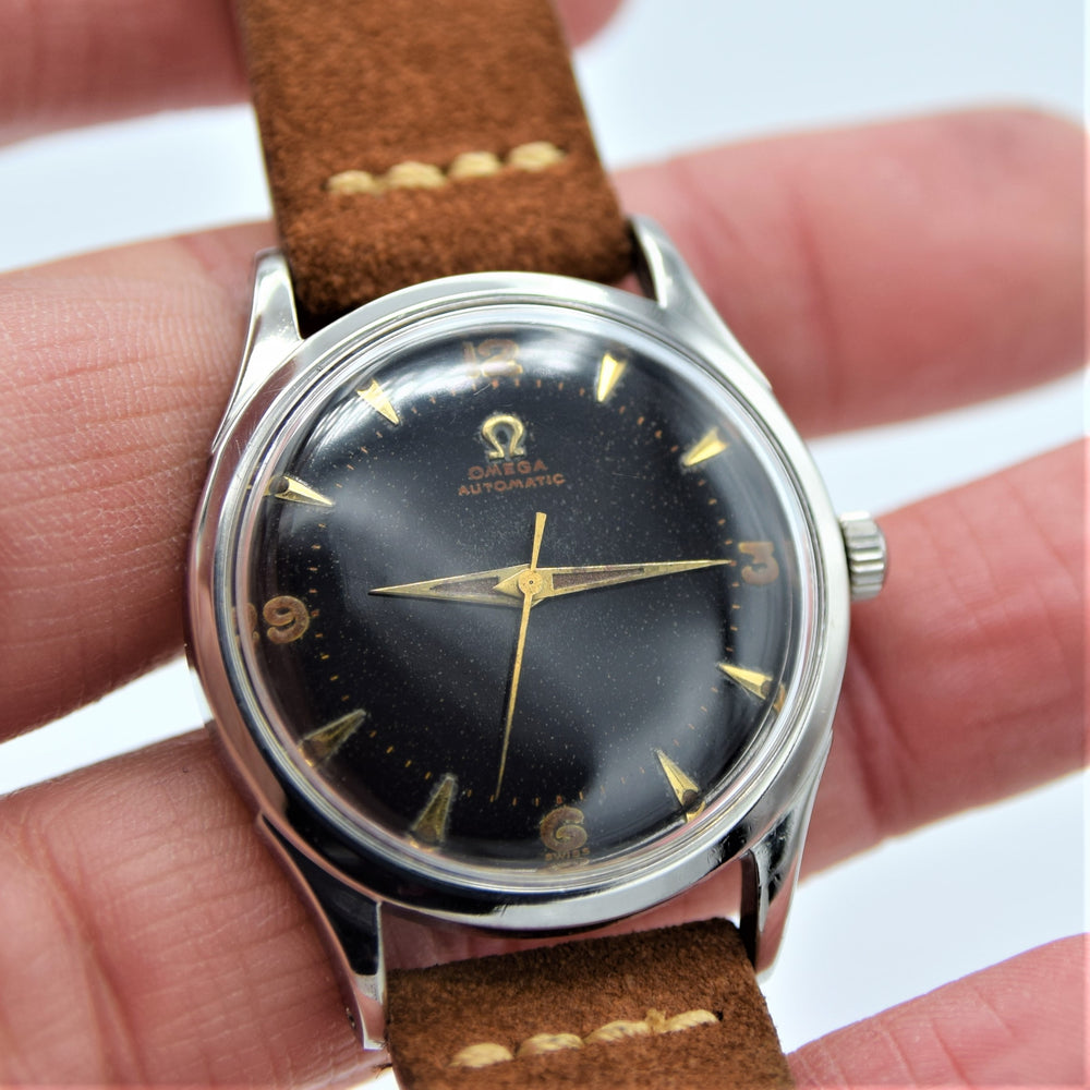 1947 Omega Early Bumper Automatic with Rare Patina Black Dial Model 2582 in Stainless Steel