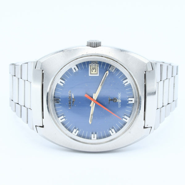 1976 Longines Large Ultronic Date Tonneau Wristwatch with Electric Blue Dial Model 8479 in Stainless Steel Case on Bracelet with Box