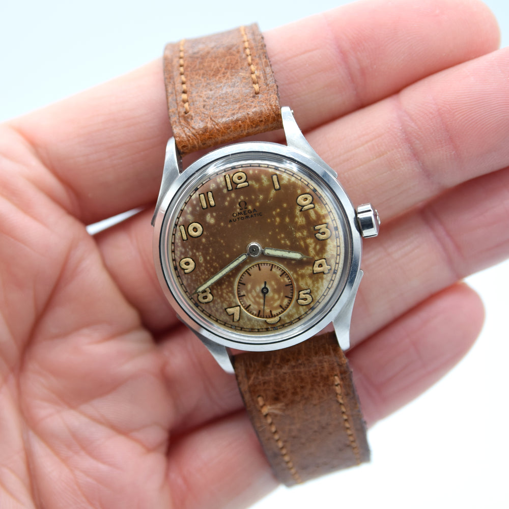1943 Omega Bumper Automatic with Pancake Dial and Rare Arabic Numerals Model 2375 in Stainless Steel with Vintage Strap and Original Buckle