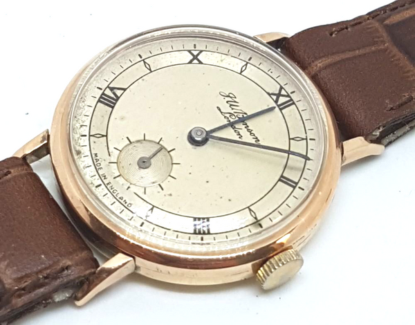 JW Benson & Smiths in solid 9ct Gold. a Dress Watch made in England dated 1950