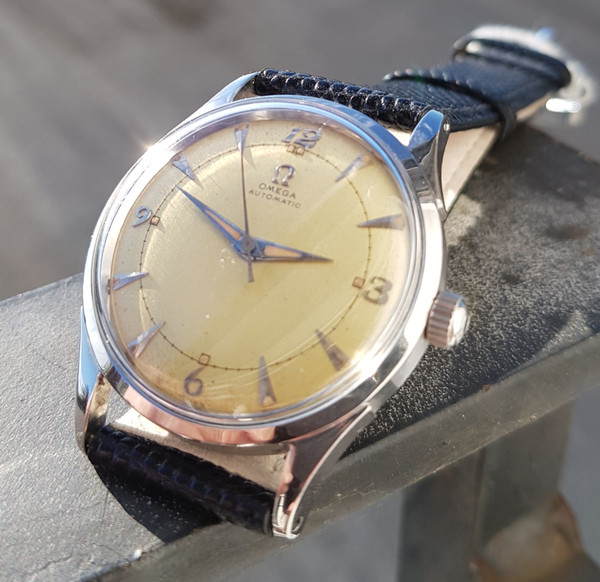 1950 Omega Bumper Automatic with Patina Dial Model 2635 in Stainless Steel