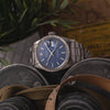 1971 Rolex Oyster Perpetual Date Model 1501 with Mosaic Blue Dial and Engine-Turned Bezel in Stainless Steel
