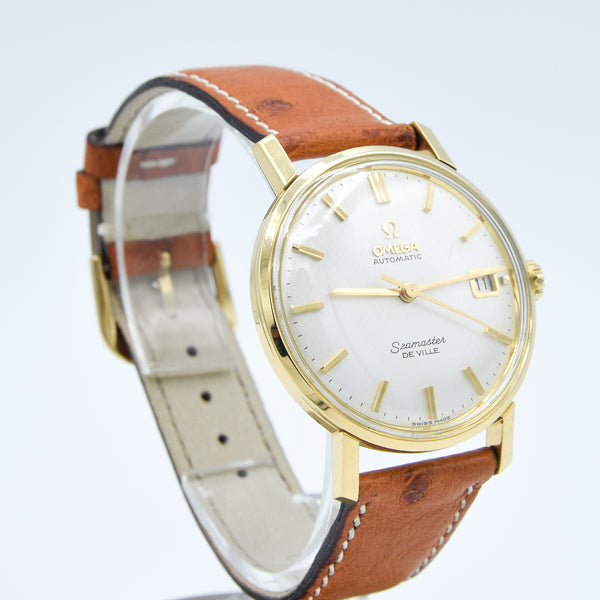 1963/64 Omega Automatic Seamaster De Ville Date Model 166.5020 in Solid 18k Gold with Linen Dial