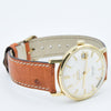 1963/64 Omega Automatic Seamaster De Ville Date Model 166.5020 in Solid 18k Gold with Linen Dial