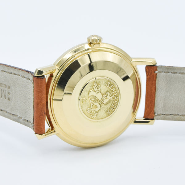 1963/64 Omega Automatic Seamaster De Ville Date Model 166.5020 in Solid 18k Gold with Linen Dial