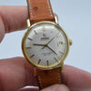 1963/64 Omega Automatic Seamaster De Ville Date Model 166.5020 in Solid 18k Gold with Linen Dial