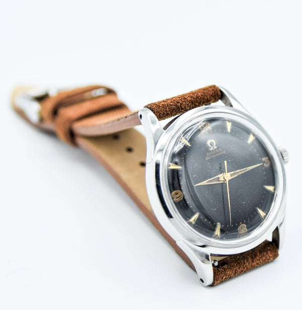 1947 Omega Early Bumper Automatic with Rare Patina Black Dial Model 2582 in Stainless Steel