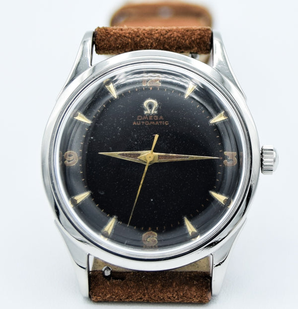 1947 Omega Early Bumper Automatic with Rare Patina Black Dial Model 2582 in Stainless Steel