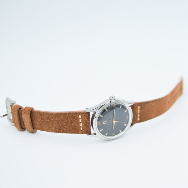 1947 Omega Early Bumper Automatic with Rare Patina Black Dial Model 2582 in Stainless Steel