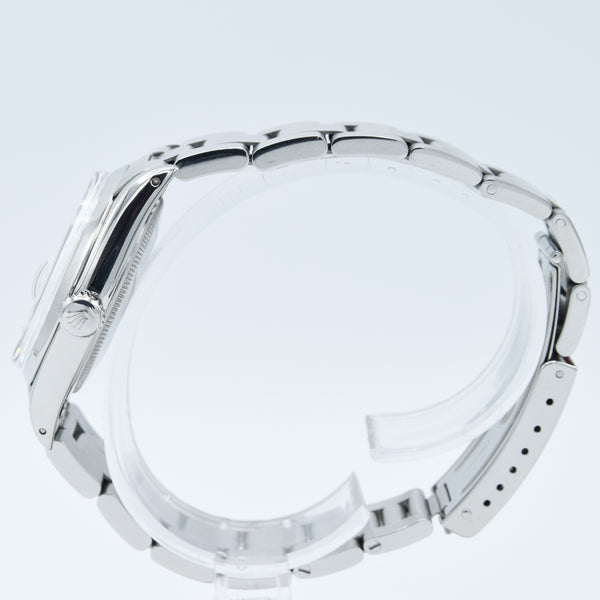 1965 Rolex Oyster Perpetual Date Model 1500 with Silvered Dial in Stainless Steel on Oyster Bracelet