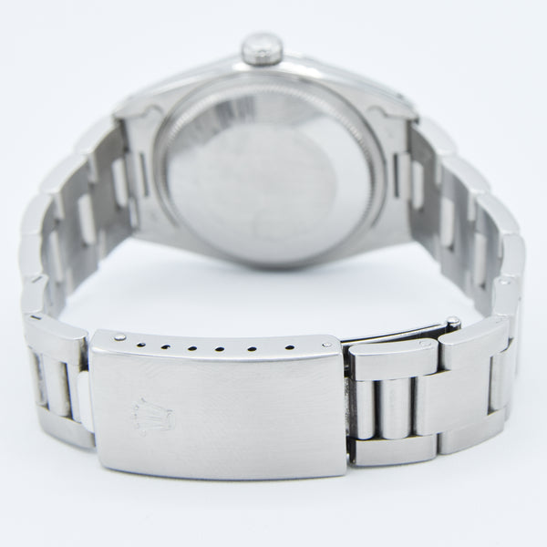 1965 Rolex Oyster Perpetual Date Model 1500 with Silvered Dial in Stainless Steel on Oyster Bracelet