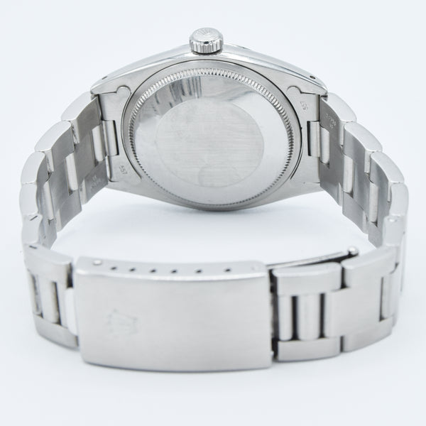 1965 Rolex Oyster Perpetual Date Model 1500 with Silvered Dial in Stainless Steel on Oyster Bracelet