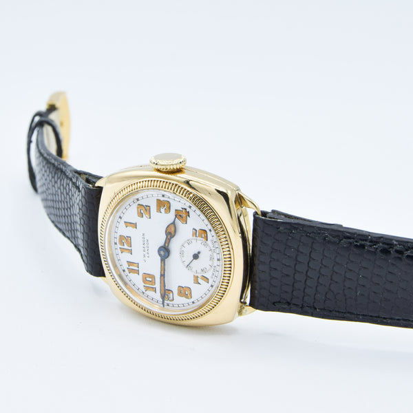 1933 JW Benson Submarine Watch with Enamel Dial and Arabic Numerals in 18ct Gold Cushion Case