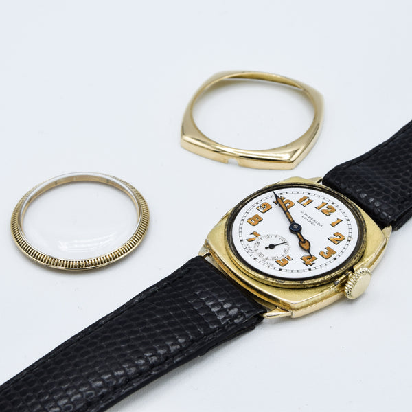1933 JW Benson Submarine Watch with Enamel Dial and Arabic Numerals in 18ct Gold Cushion Case