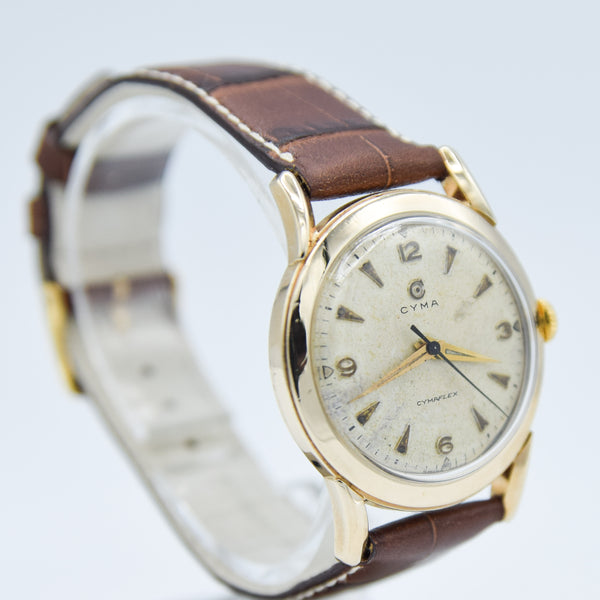 1954 Cyma Cymaflex Wristwatch Bombe Style Lugs and Mixed Arabic and Arrow Batons in Solid 9ct Gold with Original Box