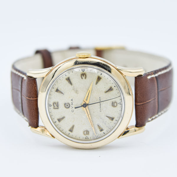 1954 Cyma Cymaflex Wristwatch Bombe Style Lugs and Mixed Arabic and Arrow Batons in Solid 9ct Gold with Original Box