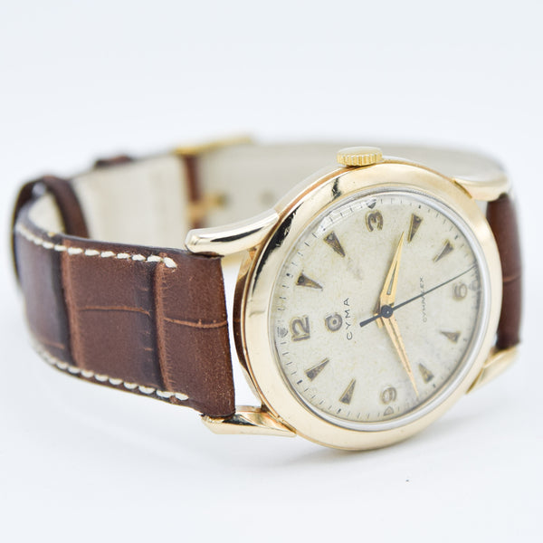 1954 Cyma Cymaflex Wristwatch Bombe Style Lugs and Mixed Arabic and Arrow Batons in Solid 9ct Gold with Original Box