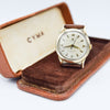 1954 Cyma Cymaflex Wristwatch Bombe Style Lugs and Mixed Arabic and Arrow Batons in Solid 9ct Gold with Original Box