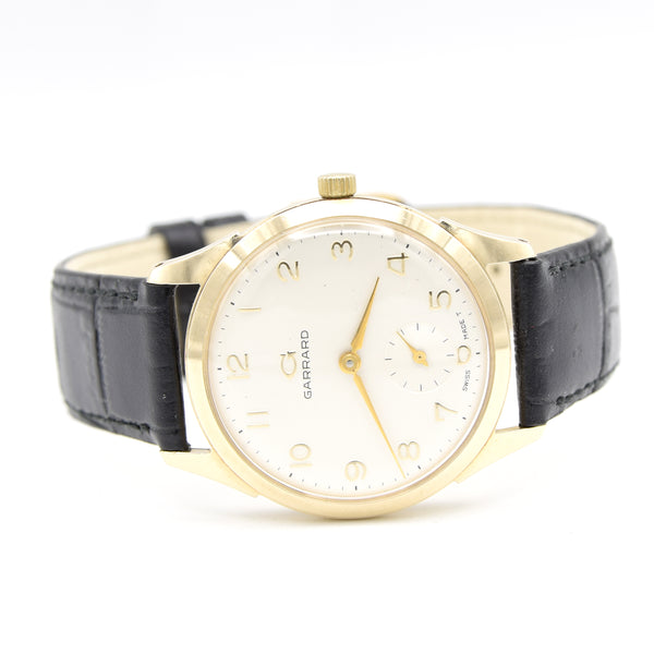 1964 Garrard of London Wristwatch in solid 9ct Gold with all Arabic dial and Original Box