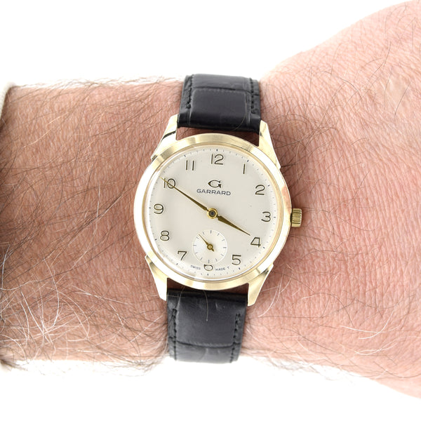 1964 Garrard of London Wristwatch in solid 9ct Gold with all Arabic dial and Original Box