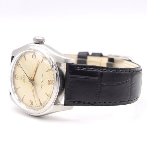 1948 Tudor Oyster Ref 7804 steel watch with original explorer-style dial, 34mm, patent Oyster crown
