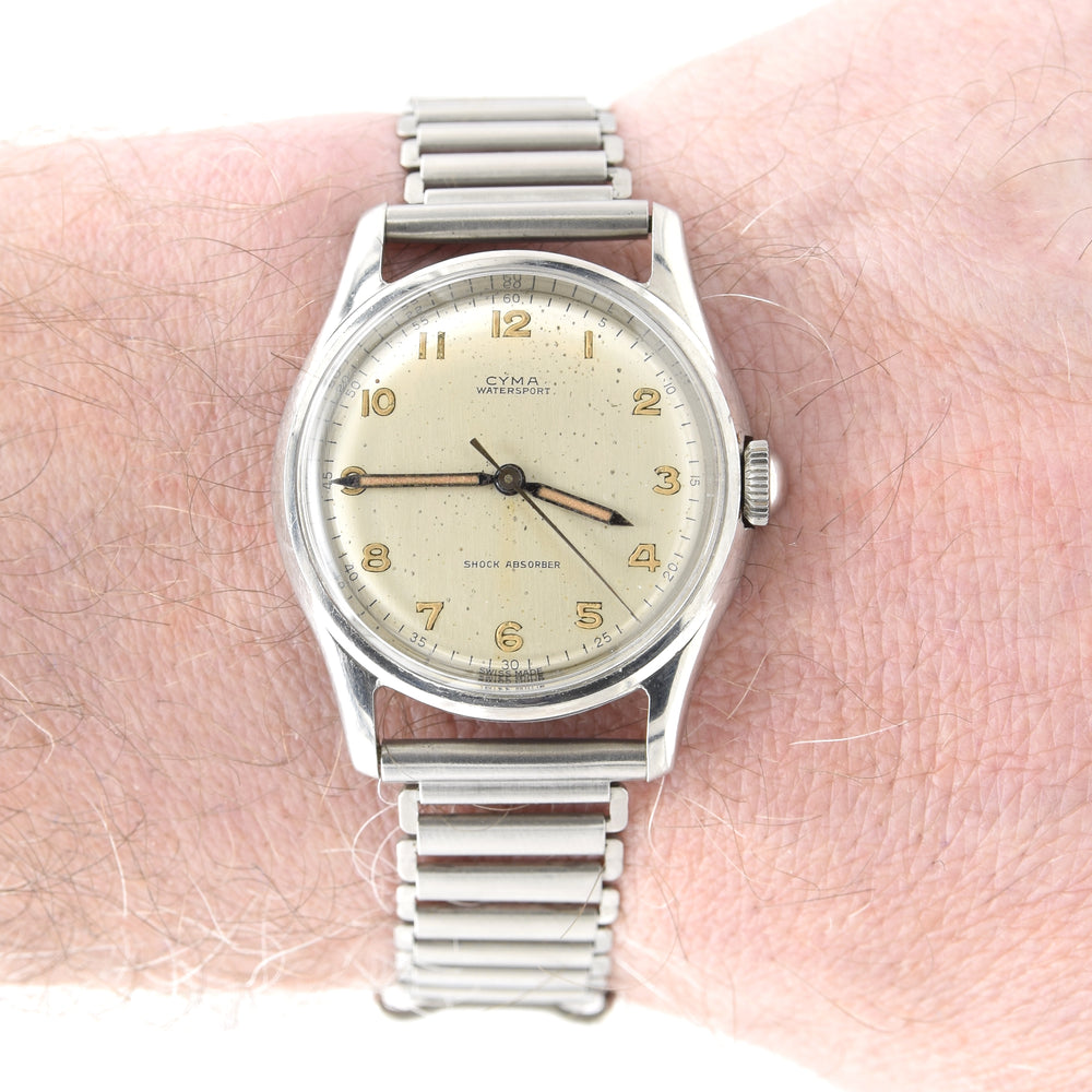 1950s Cyma Watersport steel wristwatch original all-Arabic military dial on rare GF Bonklip bracelet