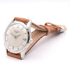 Longines watch with brown leather strap on a white background