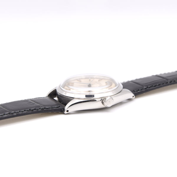 1965 Rolex Oyster Perpetual chronometer certified Model 1002 with satin silvered Dial in Stainless Steel