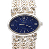 Omega De Ville watch with an oval blue speckled dial and a silver-tone chain bracelet, shown on a plain white background.
