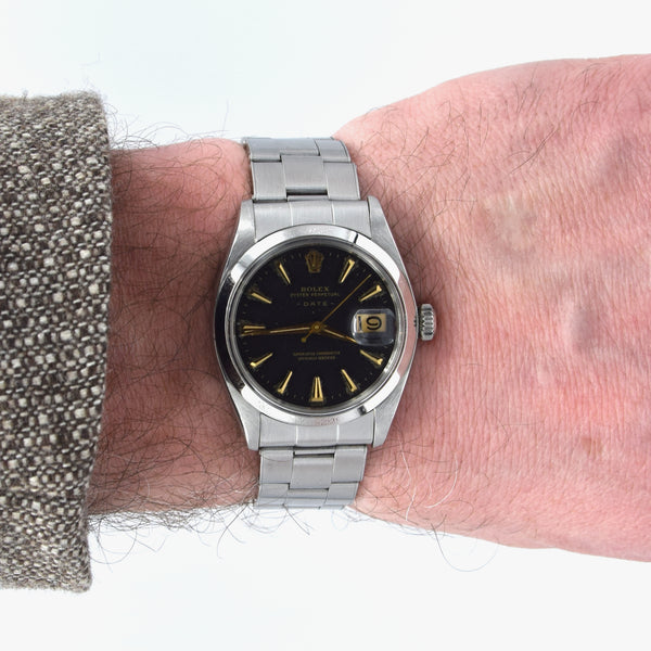 1960 Rolex Oyster Perpetual Date Model 1500 with black Dial in Stainless Steel on Oyster Bracelet