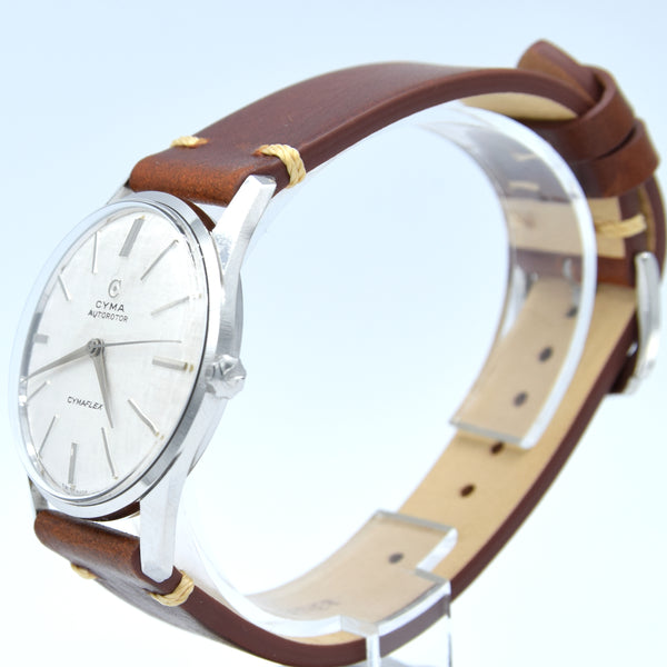 1960s larger Cyma autorotor Cymaflex Wristwatch with fabulous linen effect dial