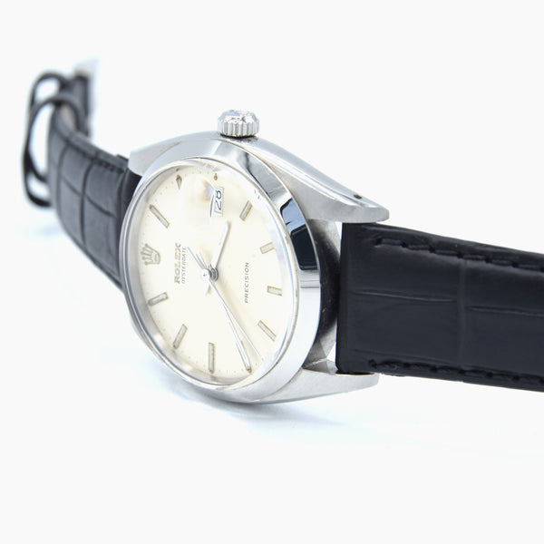 1961 Rolex Oysterdate Precision 6694 Wristwatch with baton Markers in Stainless Steel with raised Rolex original dial