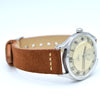 1945 Omega Bumper Automatic Wristwatch with Perfect Patina Dial and Arabic Numerals Model 2374 in Stainless Steel