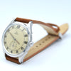 1945 Omega Bumper Automatic Wristwatch with Perfect Patina Dial and Arabic Numerals Model 2374 in Stainless Steel