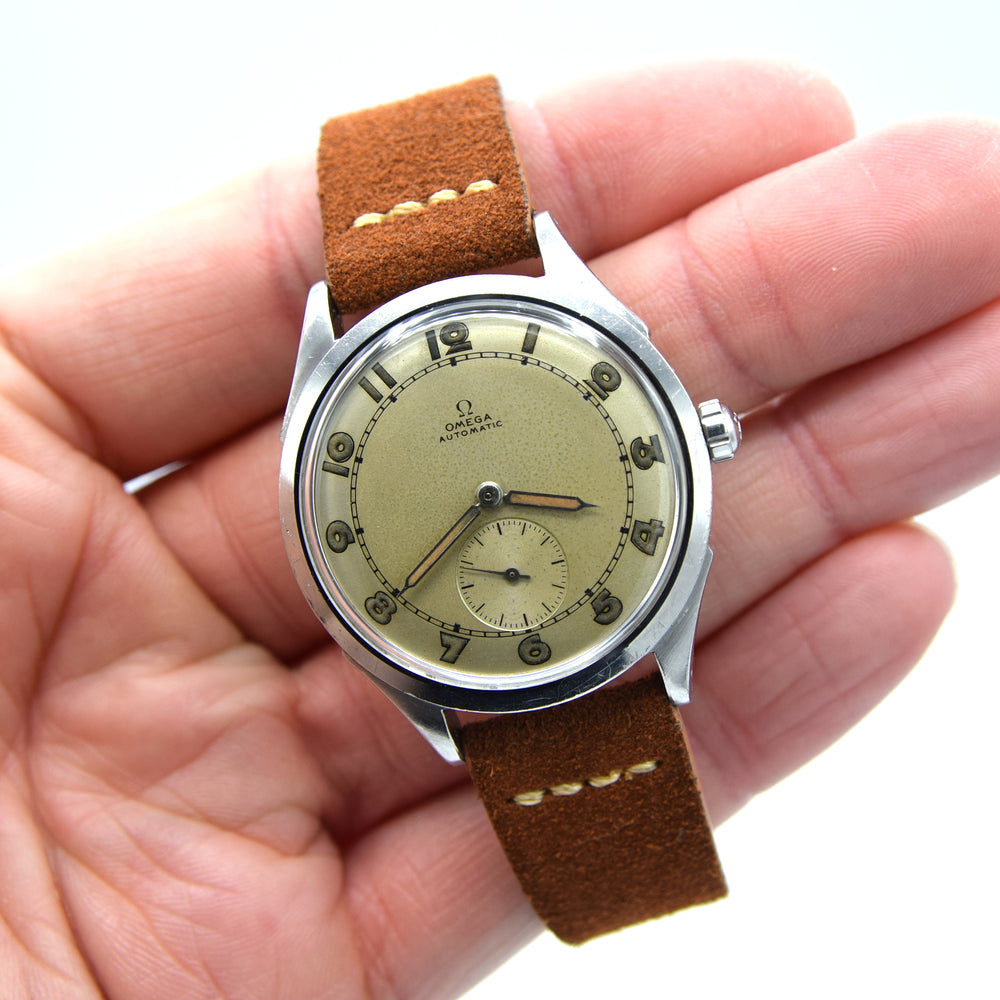1945 Omega Bumper Automatic Wristwatch with Perfect Patina Dial and Arabic Numerals Model 2374 in Stainless Steel