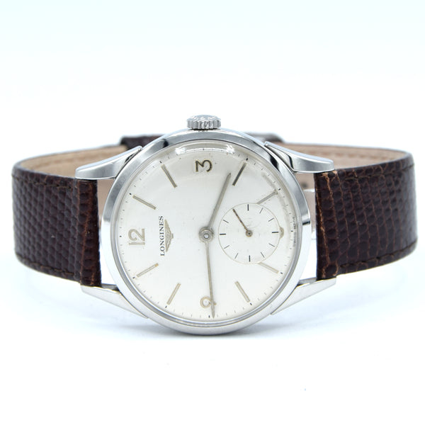 1959 Longines classic Dress Watch with Mixed line and Arabic Numerals Model 6666 with Archive extract