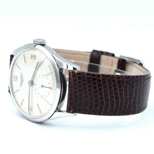 1959 Longines classic Dress Watch with Mixed line and Arabic Numerals Model 6666 with Archive extract