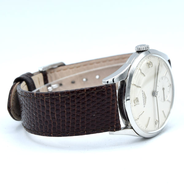 1959 Longines classic Dress Watch with Mixed line and Arabic Numerals Model 6666 with Archive extract