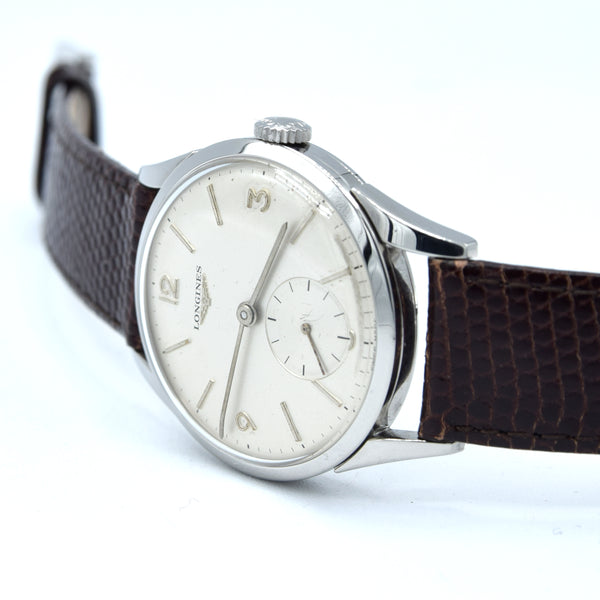 1959 Longines classic Dress Watch with Mixed line and Arabic Numerals Model 6666 with Archive extract