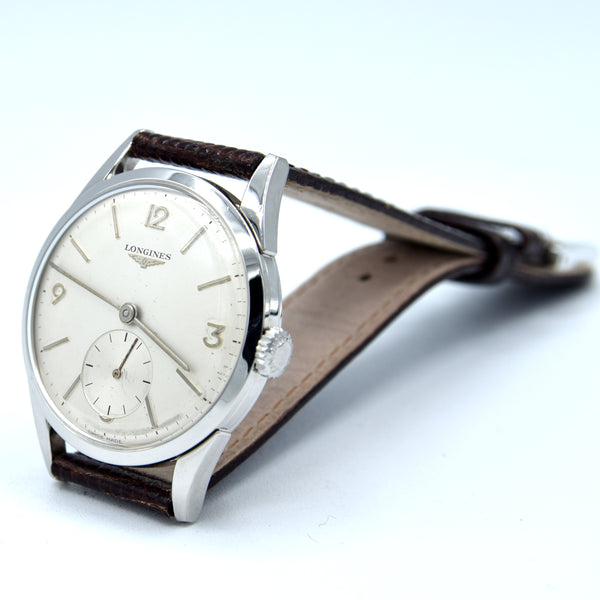 1959 Longines classic Dress Watch with Mixed line and Arabic Numerals Model 6666 with Archive extract