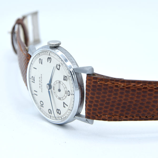 1940s New old stock unused Reda swiss 35mm wristwatch with fancy lugs on leather