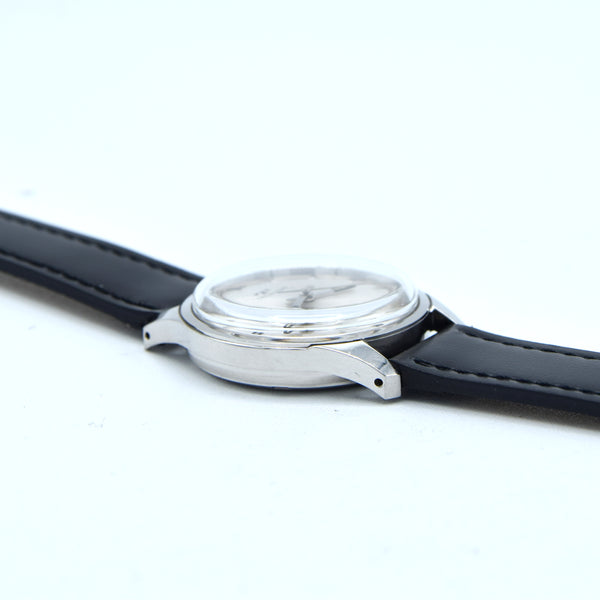 1960s Technos Mid-Size Steel Manual Wind On Leather Strap With Original Signed Buckle – Silver Sunburst Dial