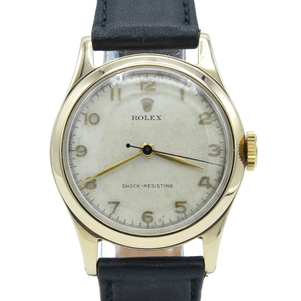 1953 Rolex Classic Dress Wristwatch in Solid 9ct Gold with Patina Arabic Dial in 30mm Unisex