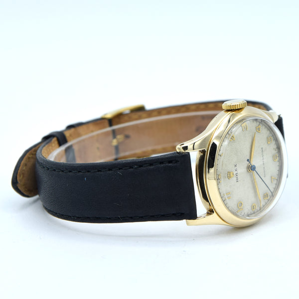 1953 Rolex Classic Dress Wristwatch in Solid 9ct Gold with Patina Arabic Dial in 30mm Unisex