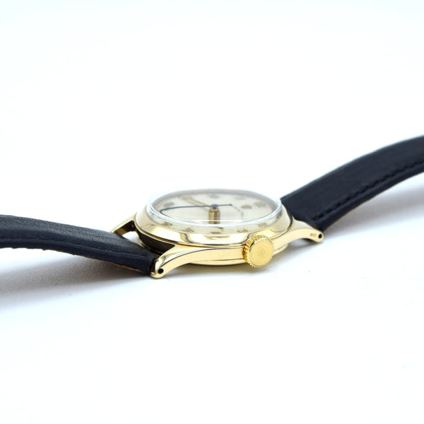 1953 Rolex Classic Dress Wristwatch in Solid 9ct Gold with Patina Arabic Dial in 30mm Unisex