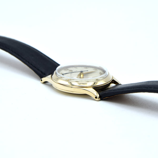 1953 Rolex Classic Dress Wristwatch in Solid 9ct Gold with Patina Arabic Dial in 30mm Unisex