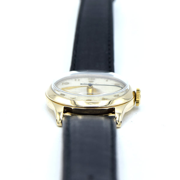 1953 Rolex Classic Dress Wristwatch in Solid 9ct Gold with Patina Arabic Dial in 30mm Unisex
