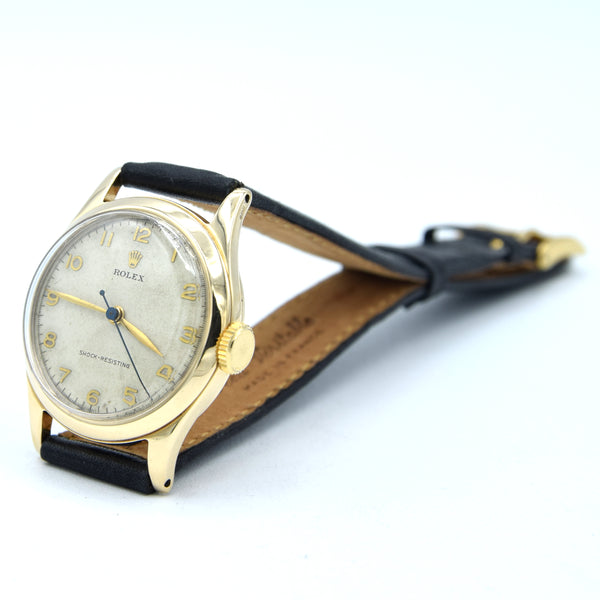 1953 Rolex Classic Dress Wristwatch in Solid 9ct Gold with Patina Arabic Dial in 30mm Unisex